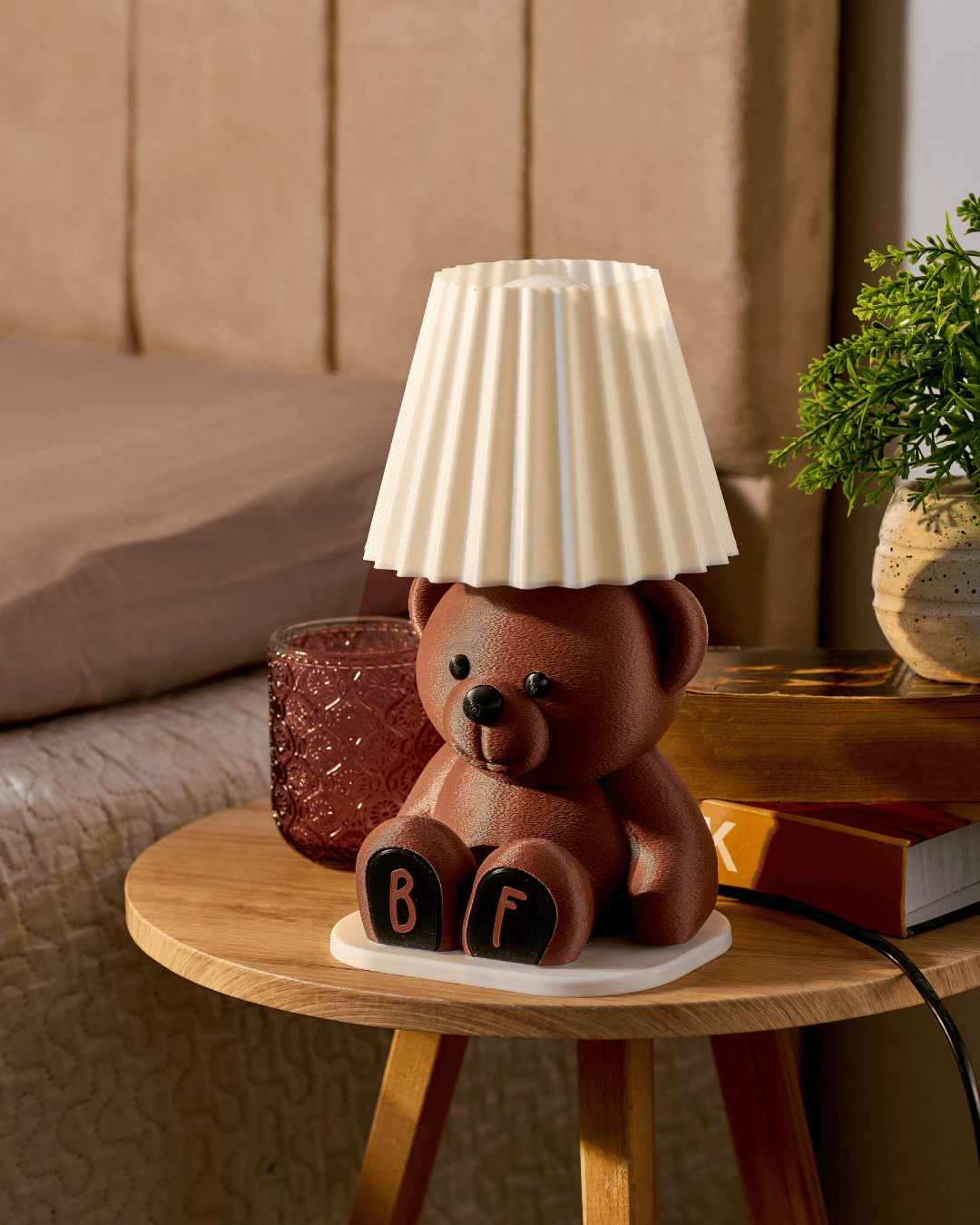 3D printed personalized brown teddy bear lamp with custom initials on the paws.