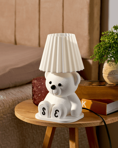 White 3D printed personalized teddy bear lamp with custom initials on the paws.