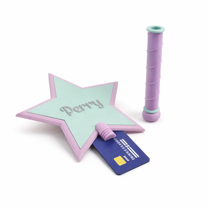 Star-shaped credit card holder with a card and purple handle on a white background